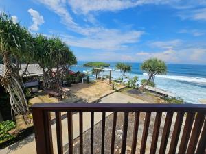 a view of the ocean from a balcony at Slili View Villa in Tepus
