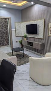 TV a/nebo společenská místnost v ubytování Nems Appartment