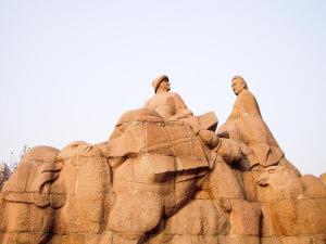 a statue of two men sitting on a rock formation at Atour Hotel Xi'an High Tech Dazhai Road in Xi'an