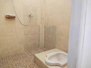 Koupelna v ubytování SPOT ON 93478 Amanda Residence Syariah + 40 fotografií