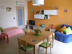Zona d'estar a Appartamento Arancione Taormina