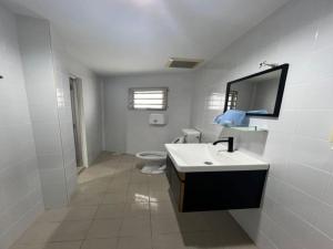 Koupelna v ubytování OYO 90994 Hotel Golden Mouse