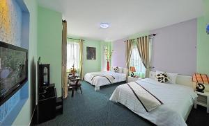 Μια τηλεόραση ή/και κέντρο ψυχαγωγίας στο Ideal Hotel Hue