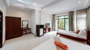 Postel nebo postele na pokoji v ubytování Nattha Waree Hot Spring Resort and Spa + 76 fotografií