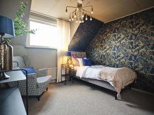 Postel nebo postele na pokoji v ubytování HAGA Hotell & Bistro
