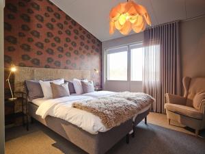 Postel nebo postele na pokoji v ubytování HAGA Hotell & Bistro