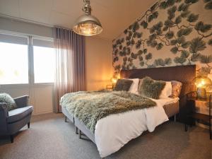 Postel nebo postele na pokoji v ubytování HAGA Hotell & Bistro