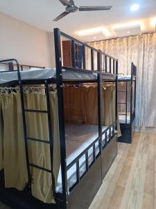 Postel nebo postele na pokoji v ubytování Janki Guest House