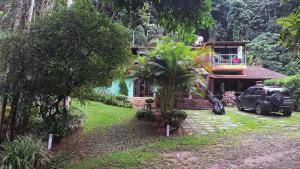Zahrada ubytování Quarto em casa na Mata Atlântica