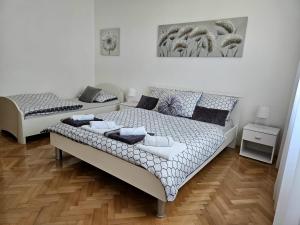 Posteľ alebo postele v izbe v ubytovaní Apartman "Roko"