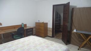Postel nebo postele na pokoji v ubytování Quarto em casa na Mata Atlântica