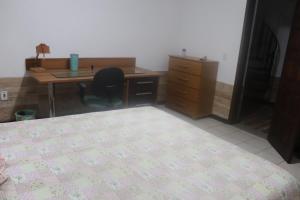 Postel nebo postele na pokoji v ubytování Quarto em casa na Mata Atlântica