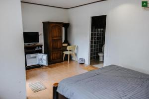 TV a/nebo společenská místnost v ubytování Pingview Villa Resort