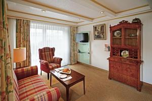Μια τηλεόραση ή/και κέντρο ψυχαγωγίας στο Hotel Appartement Landhaus Stutzi - Hotel Strandperle