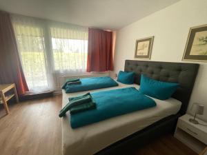 Postel nebo postele na pokoji v ubytování Casa Köstner + 37 fotografií