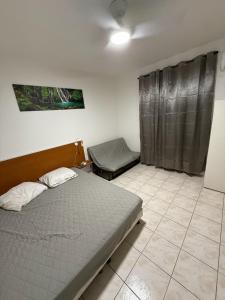 Postel nebo postele na pokoji v ubytování La suite Corossol