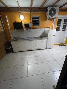 Kuchyň nebo kuchyňský kout v ubytování La suite Corossol