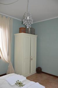 A bed or beds in a room at Casale Dolci Dimore