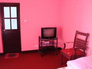 TV a/nebo společenská místnost v ubytování Stupa Resort