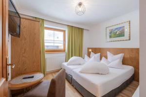 Postel nebo postele na pokoji v ubytování Landhaus Severin