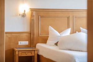 Postel nebo postele na pokoji v ubytování Landhaus Severin