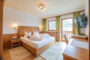 Postel nebo postele na pokoji v ubytování Landhaus Severin
