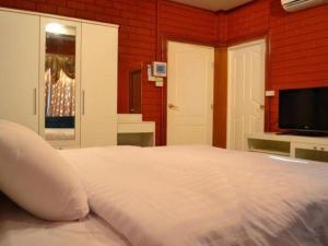 Postel nebo postele na pokoji v ubytování Lomdao Resort + 66 fotografií