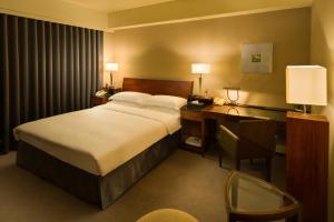 Voodi või voodid majutusasutuse Les Suites Taipei - Da An toas
