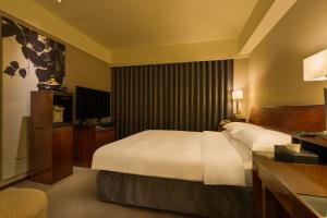 Voodi või voodid majutusasutuse Les Suites Taipei - Da An toas
