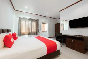 Postel nebo postele na pokoji v ubytování OYO 1131 Rendezvous Resort and Restaurant + 83 fotografií