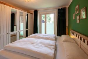 Postel nebo postele na pokoji v ubytování Ferienwohnung Am Bach 1 mit Terrasse