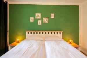 Postel nebo postele na pokoji v ubytování Ferienwohnung Am Bach 1 mit Terrasse + 11 fotografií