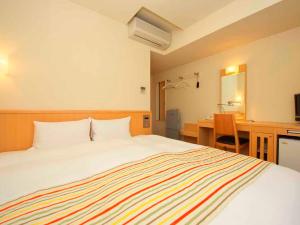 Voodi või voodid majutusasutuse Chisun Hotel Hiroshima toas +28 fotot