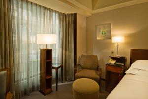 Voodi või voodid majutusasutuse Les Suites Taipei - Da An toas