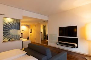 TV a/nebo společenská místnost v ubytování Scandic Berlin Potsdamer Platz
