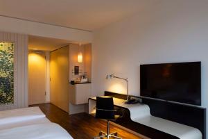 TV a/nebo společenská místnost v ubytování Scandic Berlin Potsdamer Platz