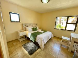 Ένα ή περισσότερα κρεβάτια σε δωμάτιο στο Oase Haus