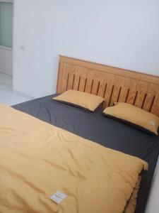 Postel nebo postele na pokoji v ubytování 143 Kim Đồng, Đà Lạt