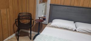 Postel nebo postele na pokoji v ubytování Farhad's B&B