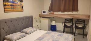 Postel nebo postele na pokoji v ubytování Farhad's B&B