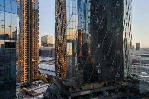 a view of a city skyline with tall buildings at Urban Gem 2BR Apartment in CBD in Melbourne