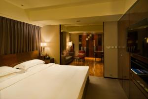 Voodi või voodid majutusasutuse Les Suites Taipei - Da An toas