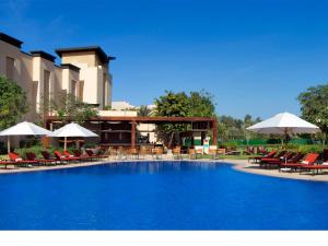 The swimming pool at or close to VOGO Abu Dhabi Golf Resort & Spa Formerly The Westin Abu Dhabi Golf Resort & Spa