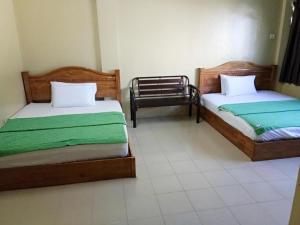 Ένα ή περισσότερα κρεβάτια σε δωμάτιο στο History Hotel