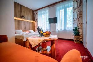Posteľ alebo postele v izbe v ubytovaní Wellness Penzion Zora Family
