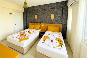 Postel nebo postele na pokoji v ubytování Nature Hotel Doğa Hotel Ölüdeniz
