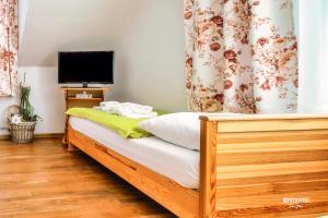 Posteľ alebo postele v izbe v ubytovaní Wellness Penzion Zora Family