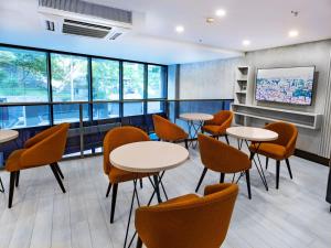 Posezení v ubytování Quinnova Hotel
