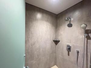 Koupelna v ubytování Arosa Hotel Jakarta