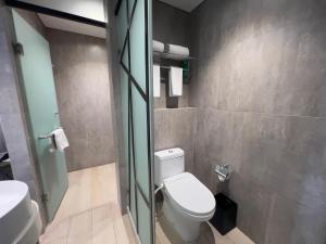 Koupelna v ubytování Arosa Hotel Jakarta
